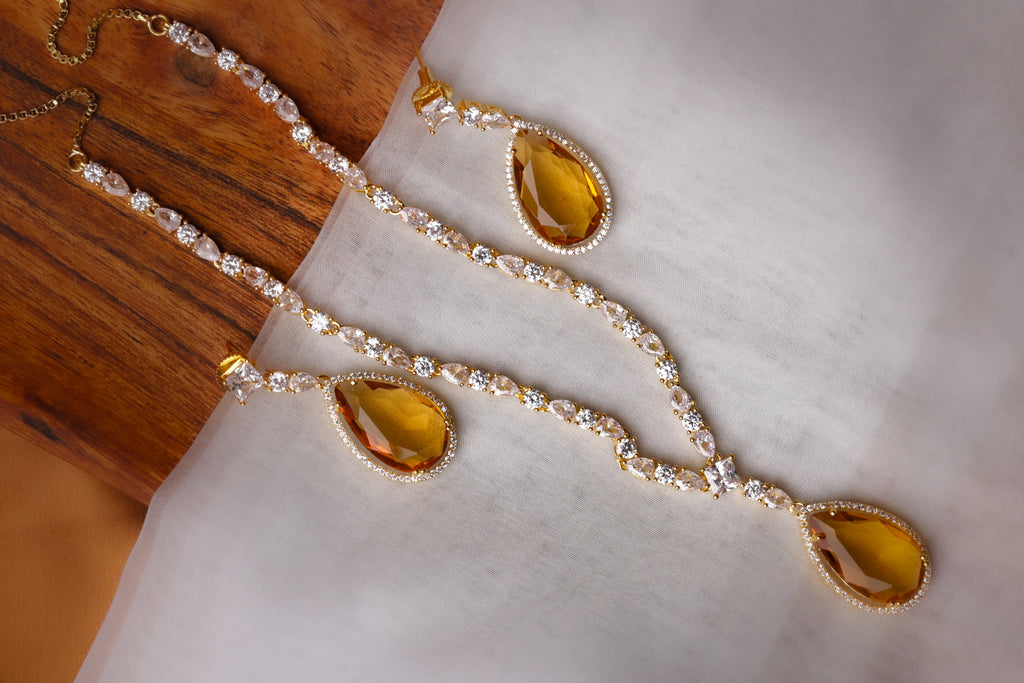 White Stone Necklace with Yellow Pendant