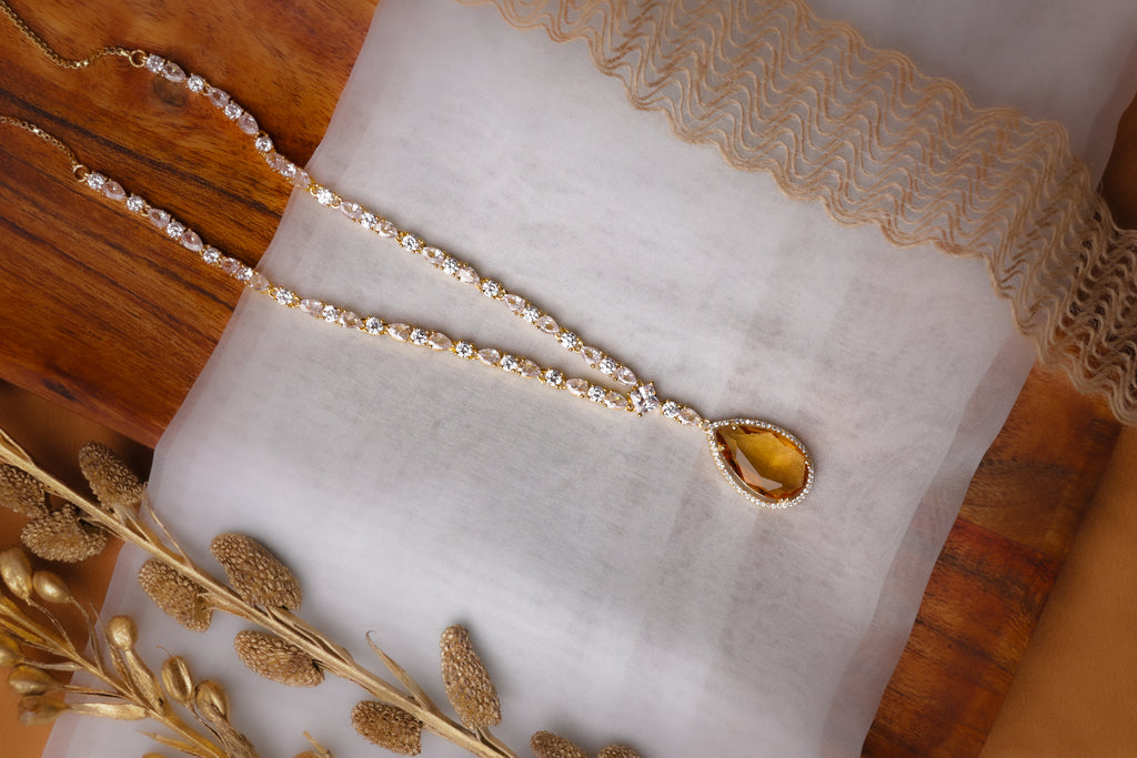 White Stone Necklace with Yellow Pendant